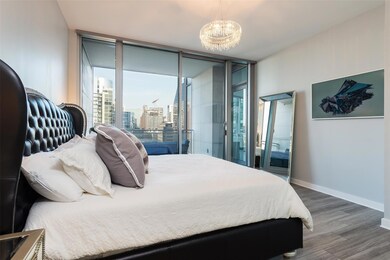 Master bedroom with balcony access.