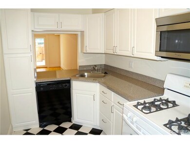Updated kitchen with new cabinets, newer appliance