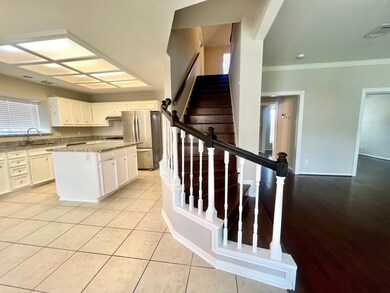 Kitchen next to the arch stairs