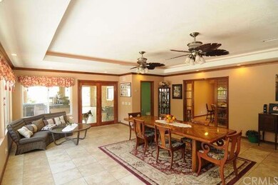Family room features 1/2 bath, pocket French doors
