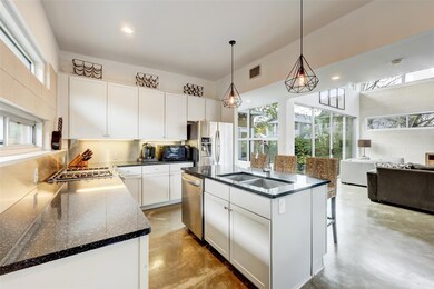 Kitchen featuring a sink, appliances with stainle