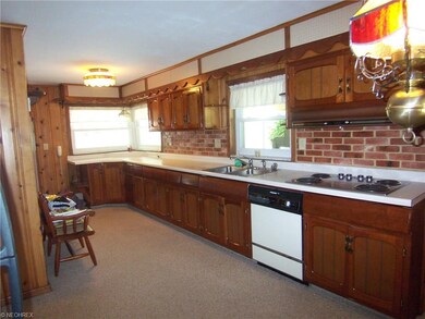 Galley style kitchen with older quality craftsman 