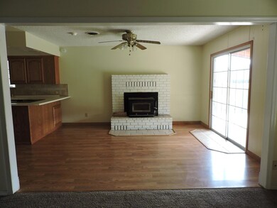 Dining Room with fireplace and slider
