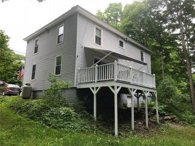 Side/back view of home. Nice deck...