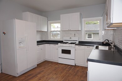 Kitchen is new with cabinets and countertops and b