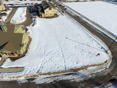 R-3 zoned corner lot across from park!