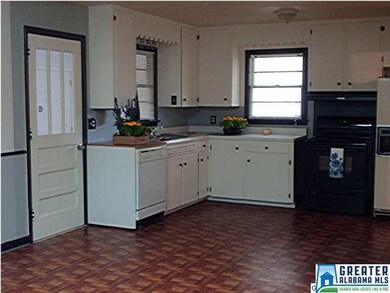 View of Kitchen and part of dining room. Kitchen h