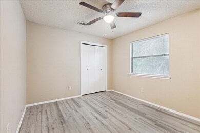 Unfurnished bedroom featuring wood finished floor