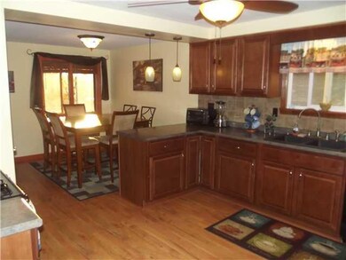 Kitchen Beautiful Cherry wood cabinets,ceramic til