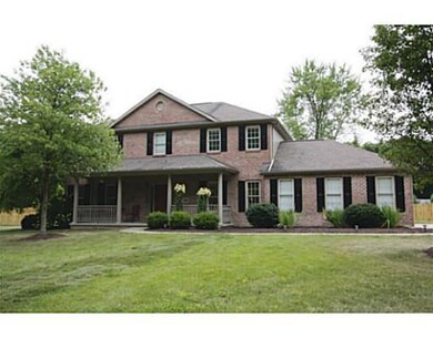 Exterior Front. The front yard has newer landscape lighting, lamp post light, and new motion flood light above garage.