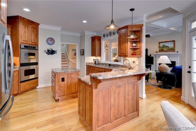 Spacious kitchen with center island, gas cooking,