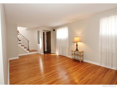 Living Room View from Front door and Coat Closet