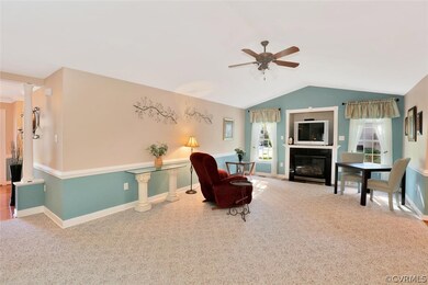 Great Room with Vaulted Ceiling and Fireplace