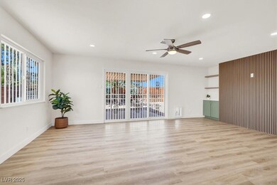 House has covered patio. big living room.