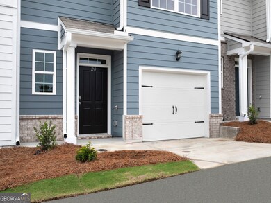 Pearson townhome exterior with blue color vinyl an