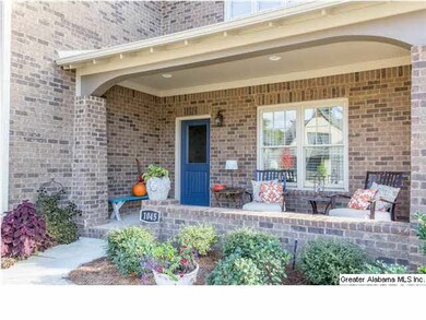 Inviting front porch welcomes family and friends a