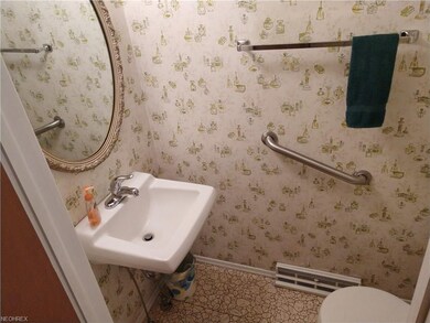 Half bath near the garage, front entry and family 