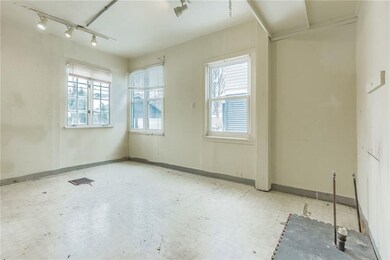 Current pre-renovation gutted kitchen