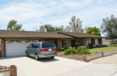 Front yard Brick and stucco retaining walls 