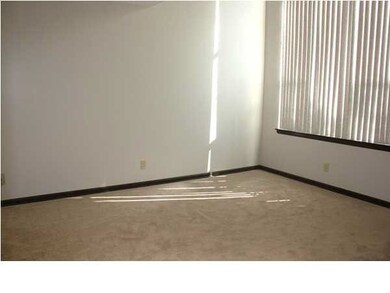 Dining room is just off the kitchen and has a slid