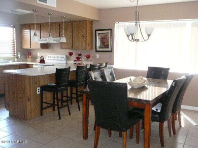 View of dining room and kitchen