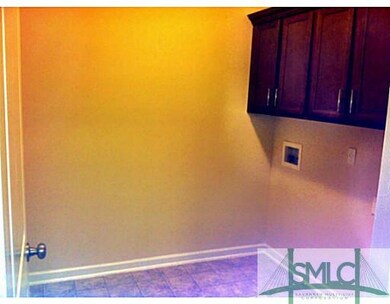 Other. laundry on 1st floor with Cabinets