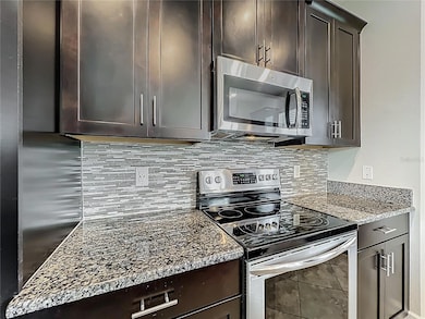 10182 Authors Way, Orlando, FL 32832 - photo 7