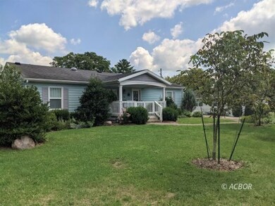 Front of house with yard view