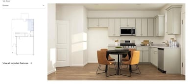 Kitchen featuring stainless steel appliances, light wood finished floors, baseboards, and gray cabinetry