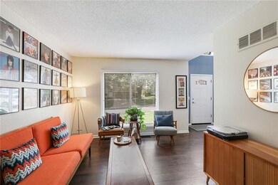 There are TWO living areas on the first floor -- t