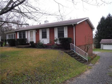 Right side view from driveway.