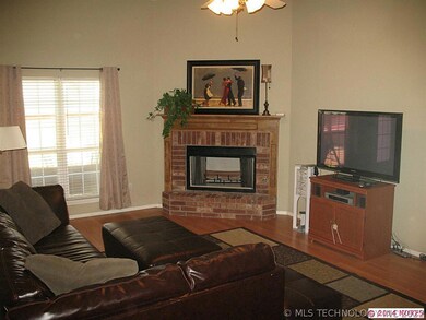 Great room next to kitchen with gas starter / wood