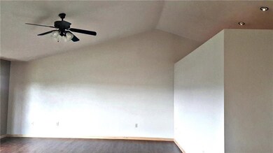 Vaulted ceilings are featured in the dining room, 