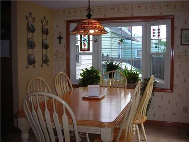 Kitchen Bay window and sliding glass door to patio