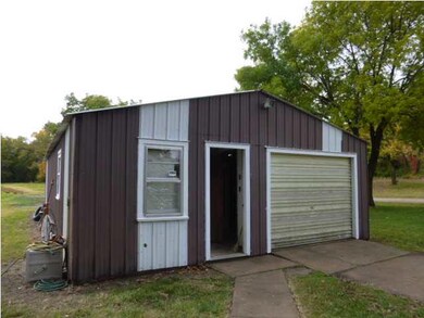 Ag building with 2 overhead doors, you can driver 