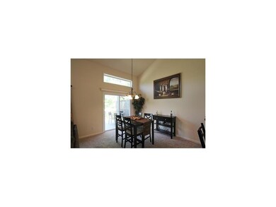 Dining Area. Dining area with glass sliders to dec