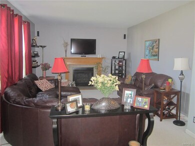 Carpeted Family Rm w/surround sound + gas fireplac