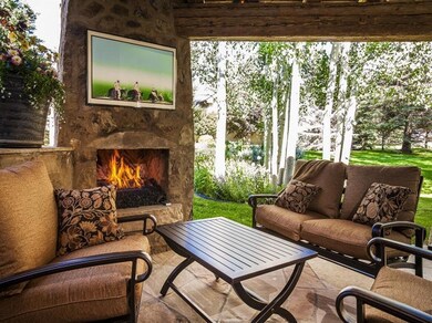 Covered patio with built-in gas grill an