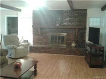 HUGE MASONRY FIREPL W/SIT DOWN HEARTH FOR LOTS COZ