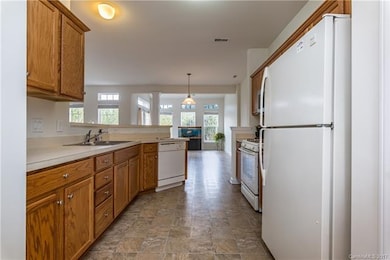 Large kitchen with abundant storage and counter sp