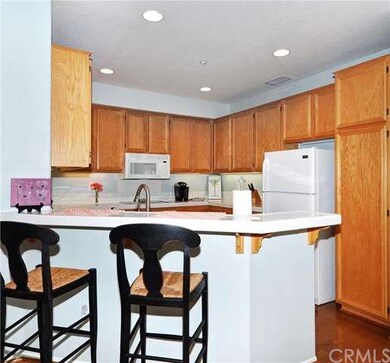 Open kitchen with sit up bar