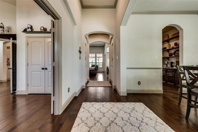 Front entry, dining room to the right, office/BR left.