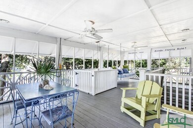 The side porch is perfect for relaxing on swing ha