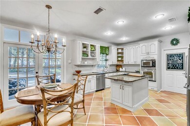 Chef's Kitchen with Eat-In Dining and French Doors