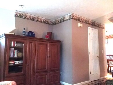 Half bathroom located off the living room on the m