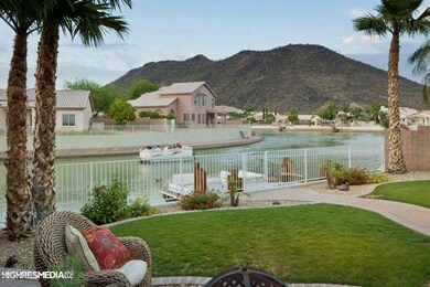 Backyrd grassy paver dock boat mntn