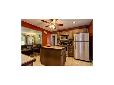 Stainless steel refrigerator remains with home.