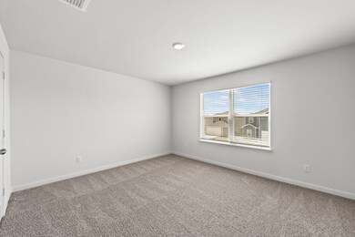 Unfurnished room with carpet flooring and baseboards