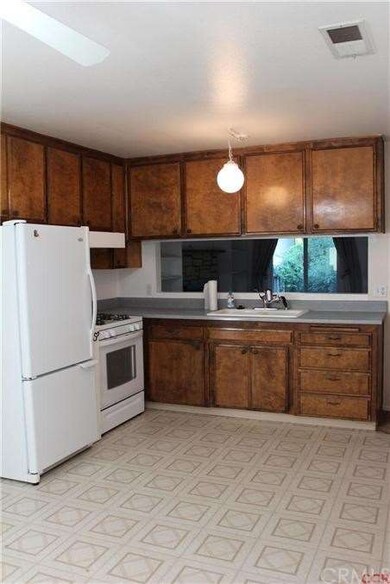 Open kitchen with large windows for plenty of natu
