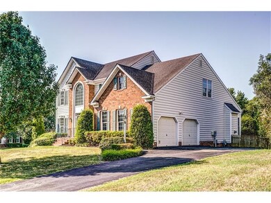 Established Yard, Two Car Garage, Paved Driveway a